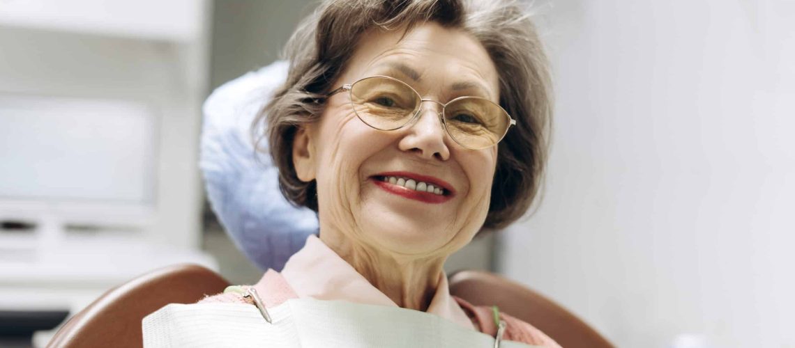 Senior woman smiling during dental checkup